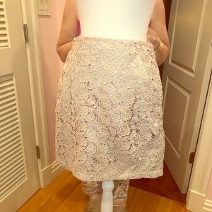 Lace beige skirt.